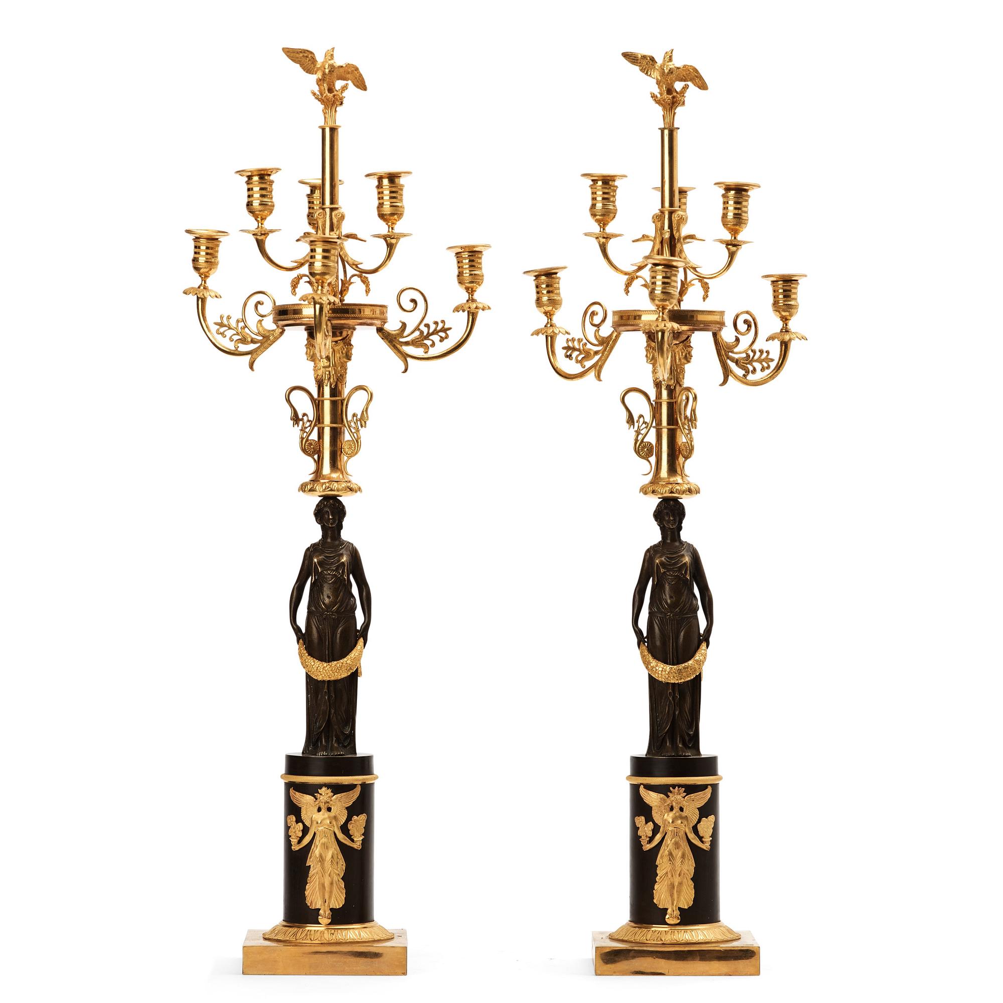 A pair of Empire early 19th century six-light candelabra.