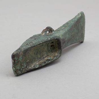 A bronze axe, 1500-500 B.C.