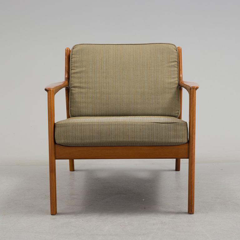 An 'USA 75' easy chair by Folke Ohlsson, Dux.