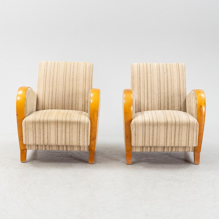 A pair of Swedish Modern easy chairs, Dux T-serie, 1940's/50's.