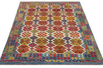 An Afghan Kilim carpet, c. 297 x 206 cm.