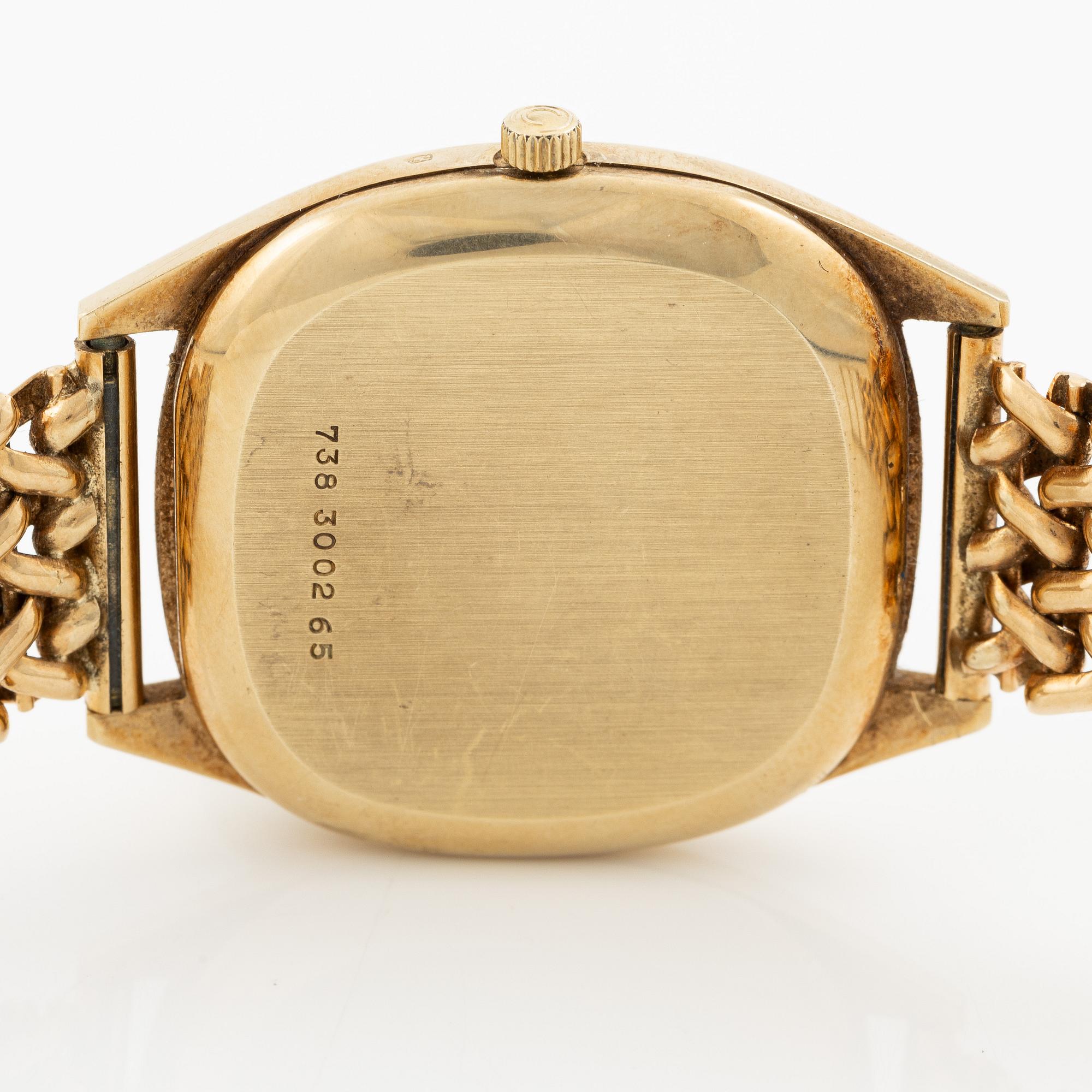 Certina, 14K gold, chain in 18K gold, 33.5 mm.