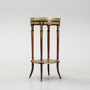 A French Louis XVI-style table, first half of the 20th century.