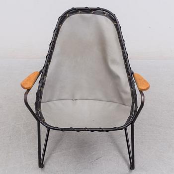 A 1950s easy chair.