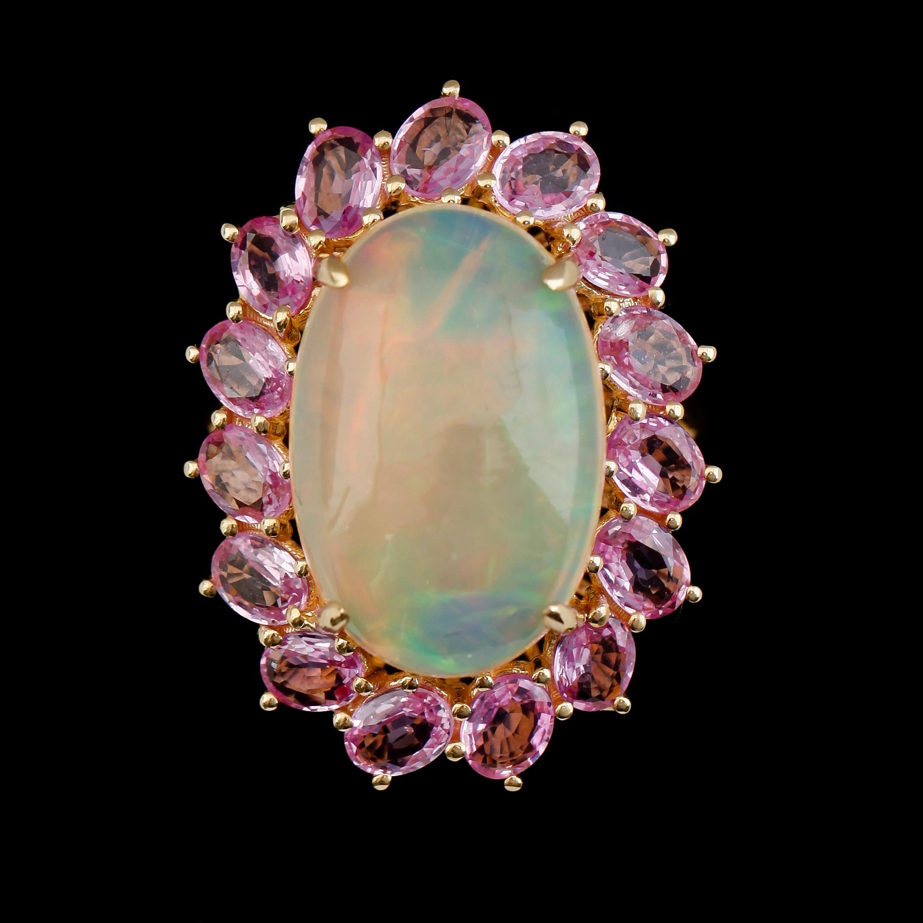 RING, 18K guld, opal och safirer.