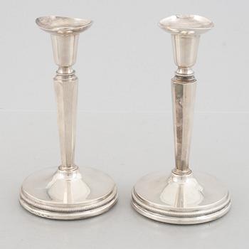 Two pairs of Swedish silver candlesticks, including Eric Löfman, MGAB, Uppsala 1979-1982.