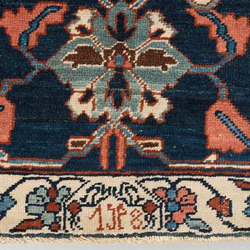 A CARPET, an antique Bakshaish, ca 693 x 398,5 cm, dated "1298"AH/1880 AD probably.