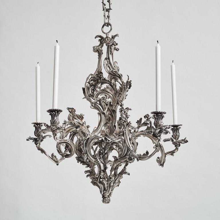 A highly important and rare Louis XV silvered brass
five-light chandelier  attributed to Pierre Boulanger, Paris c 1750.