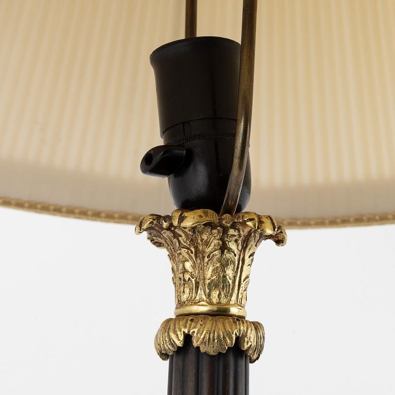An Empire style brass table lamp, 20th Century.