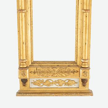 A lat Gustavian mirror from around  the year 1800.