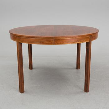 A rosewood dining table by Bertil Fridhagen for Bodafors.