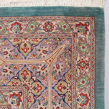 A CARPET, Old silk Qum, signed Moghadam, ca 309,5 x 190,5 - 193 cm.