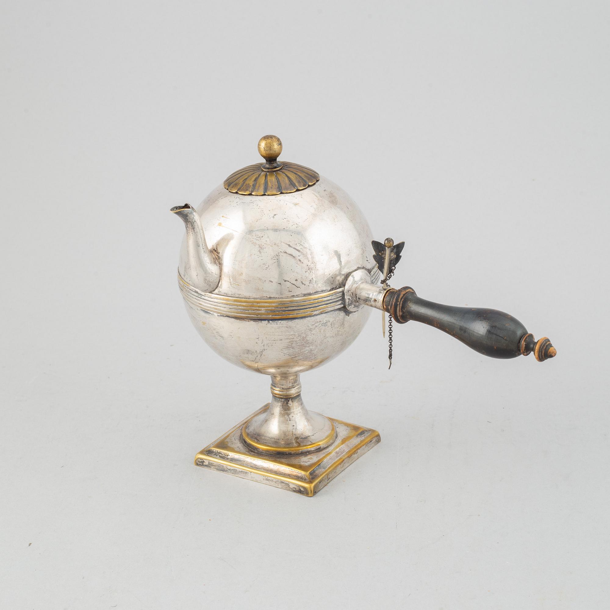 An Empire 19th century silvered brass teapot.