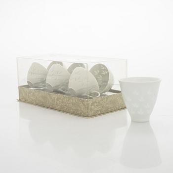 Friedl Holzer-Kjellberg, six espresso cups with saucers, and a sugar bowl, rice porcelain, signed in the ware F.H. Kj Arabia Finland.