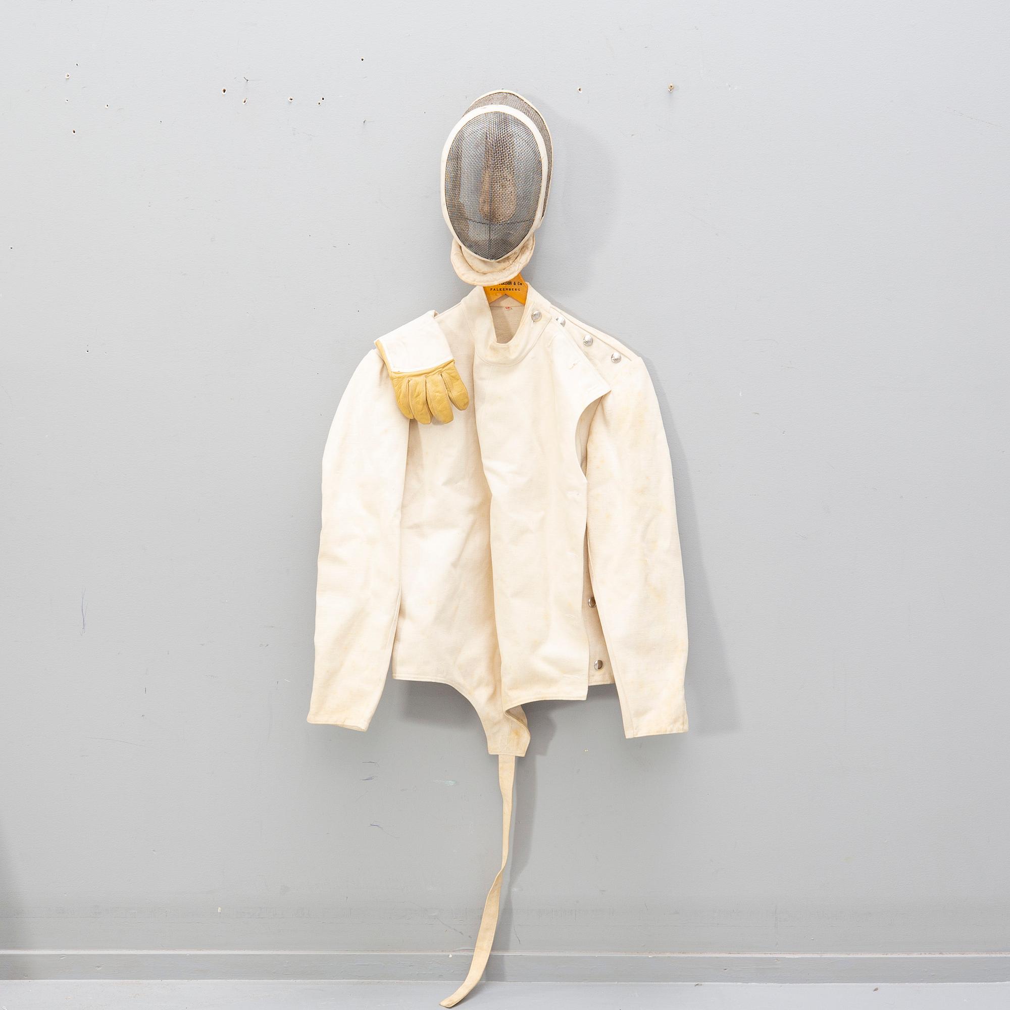 A French set of sword, mask and clothing for fencing, mid/second part of the 20th century.