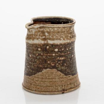 Kyllikki Salmenhaara, a stoneware creamer signed KS Arabia.
