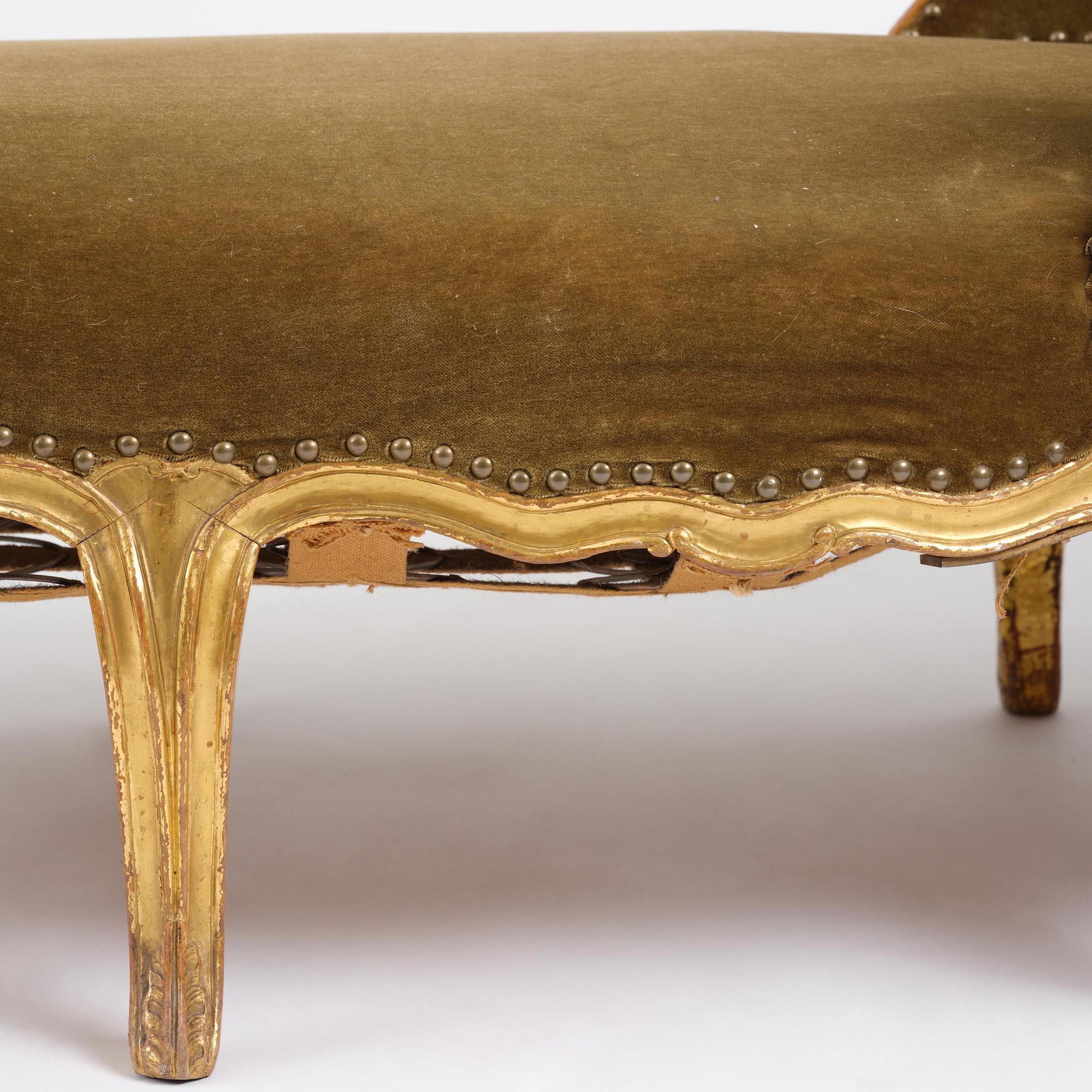 A French Louis Xv giltwood lit de repos, later part 18th century.