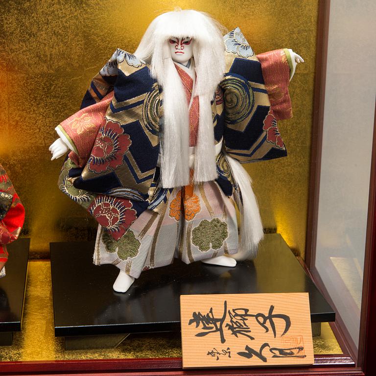 Four late 20th century Japanese dolls.