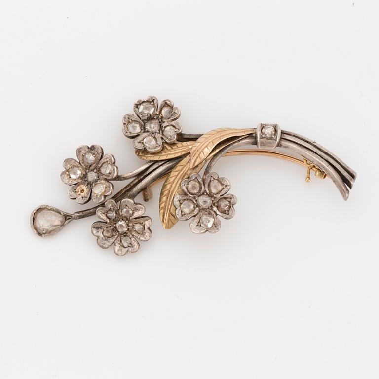 A rose-cut diamond brooch.