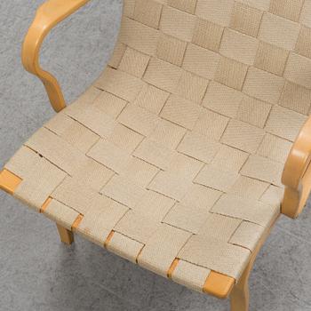 An 'Eva' easy chair by Bruno Mathsson for Dux.