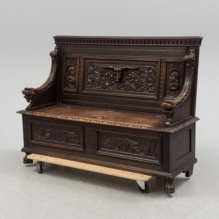 A oak Baroque style bench from around year 1900.