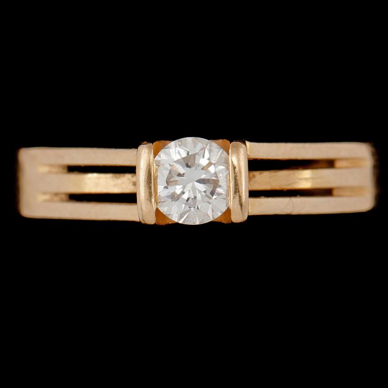 RING, 18k guld med briljantslipad diamant  0.27 ct, Guldfynd, 1985. Vikt 2 g.