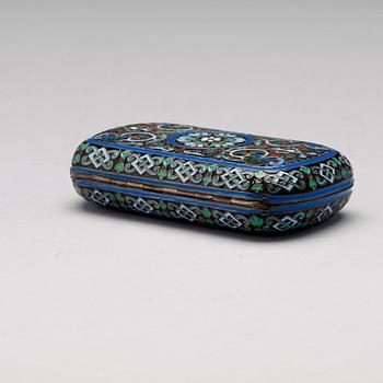 A Russian late 19th century silver-gilt and enamel cigarette-case, mark of Ovchinnikov, Moscow.