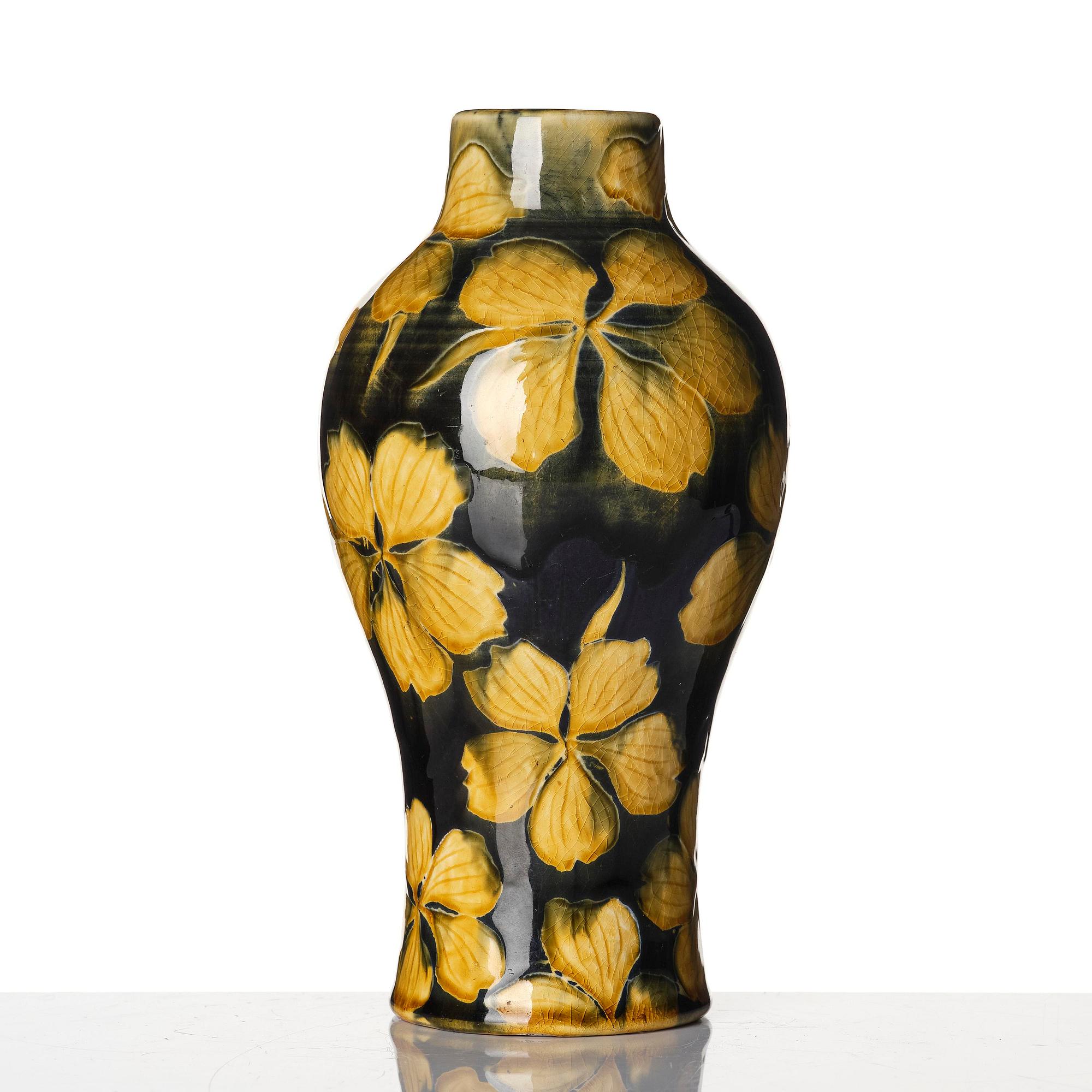 Gunnar G:son Wennerberg, an Art Nouveau glazed creamware vase, Gustavsberg, Sweden, early 20th century.