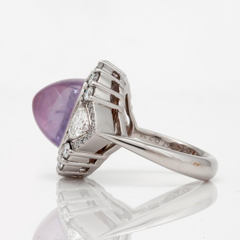 An unheated pink sapphire and diamond ring.