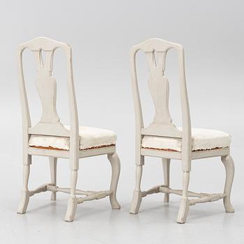 A pair of Rococo-style chairs, 20th century.