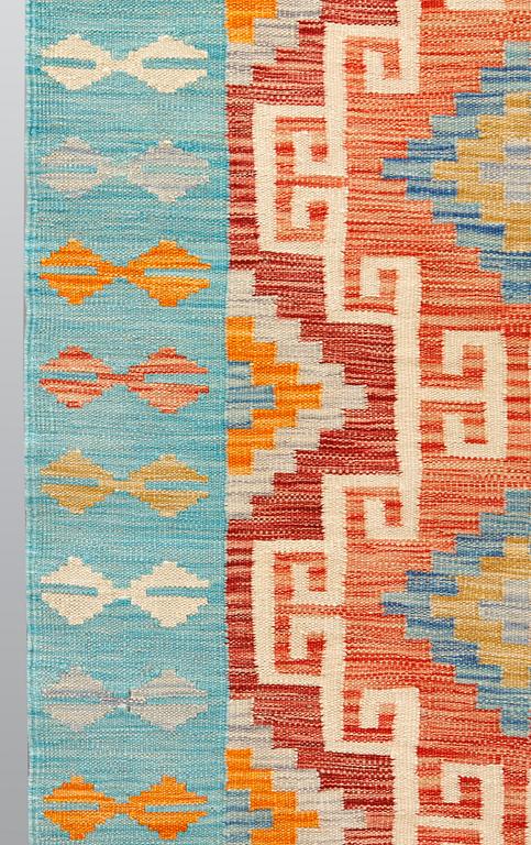 A kilim runner, ca 492 x 100 cm.
