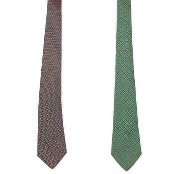 462. A set of two silk ties by Hermès.