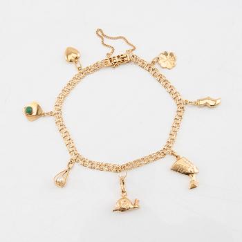 Bracelet Bismarck link 18K gold with charms.