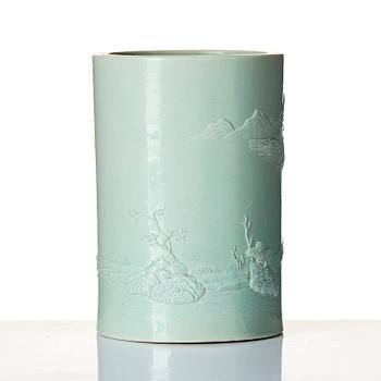 A pale green glazed brush pot, Qing dynasty, 19th Century.