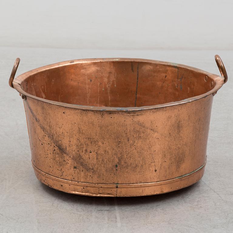 A 19th century copper cauldron.