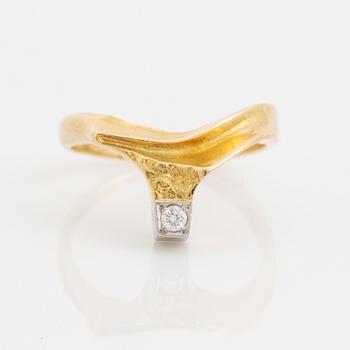 Björn Weckström, An 18K gold Lapponia ring DIamond promise" set with a round brilliant-cut diamond.