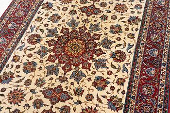 A semi-antique Isfahan rug, c. 225 x 143 cm.
