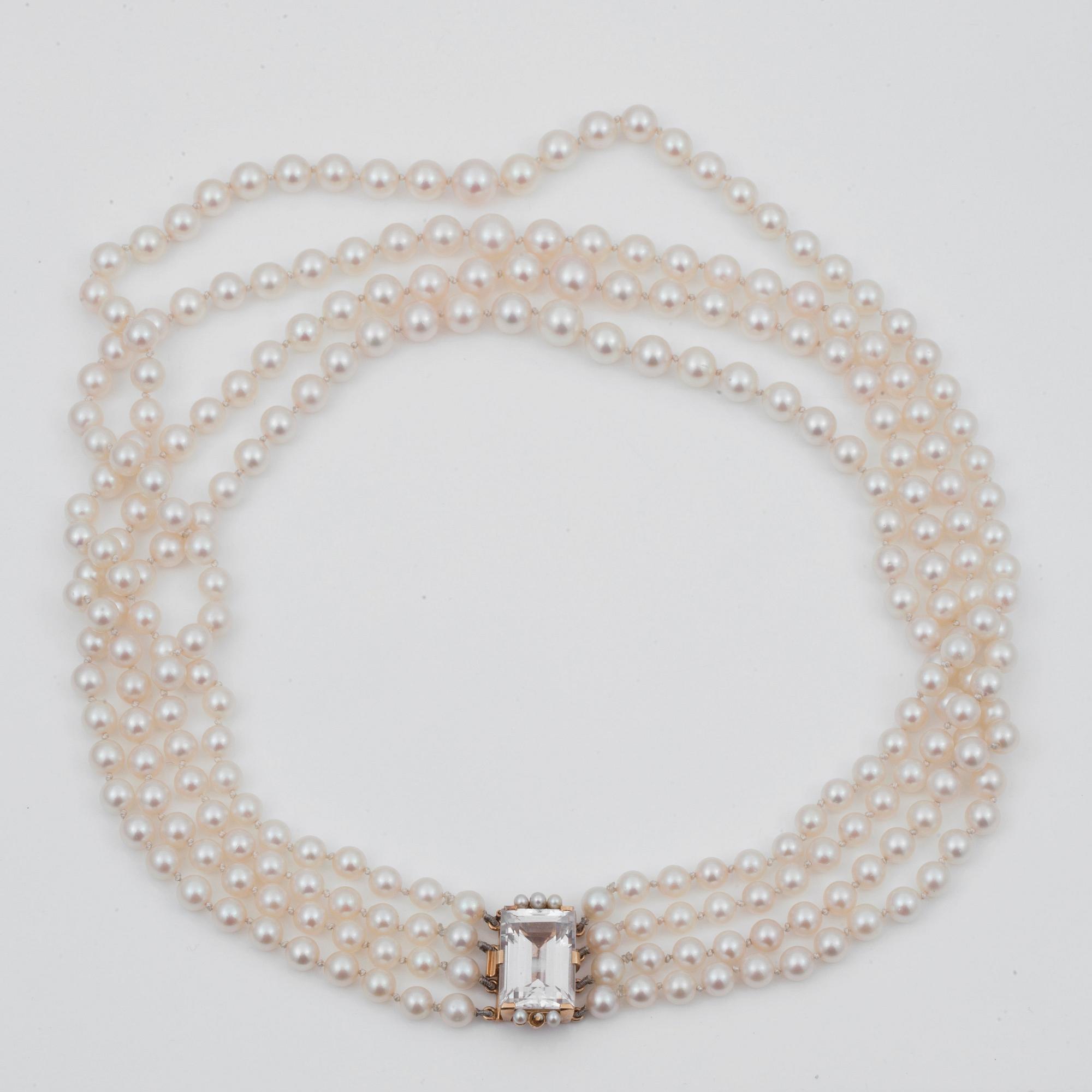 A 4-strand cultured pearl necklace. Clasp set with rock crystal.