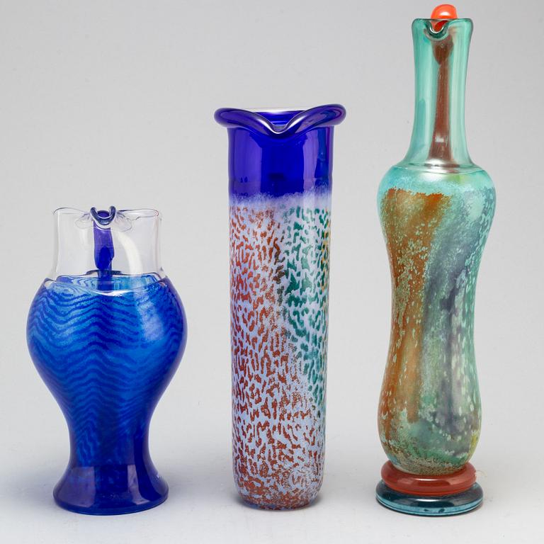 KJELL ENGMAN, three glass pitchers, signed, for Kosta Boda.