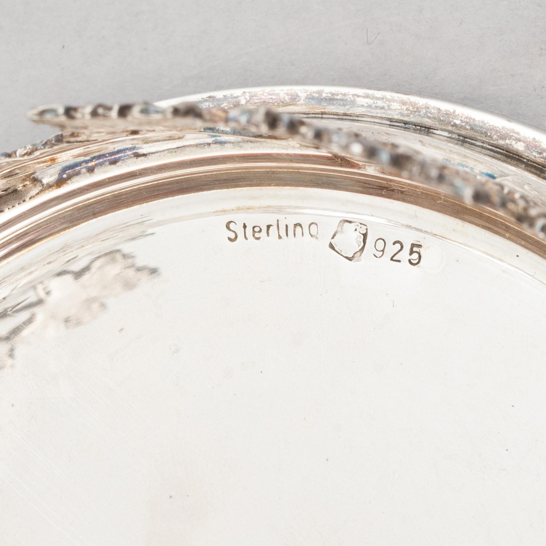 Coasters/flaskunderlägg, ett par, sterlingsilver, 1900-tal.