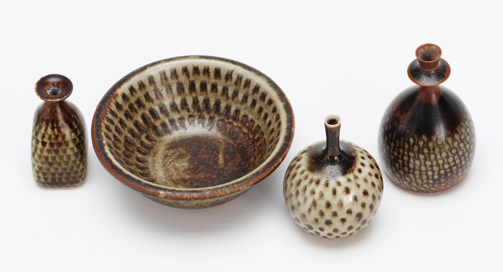 A set of four Stig Lindberg stoneware miniatures, Gustavsberg studio 1960'-70's.