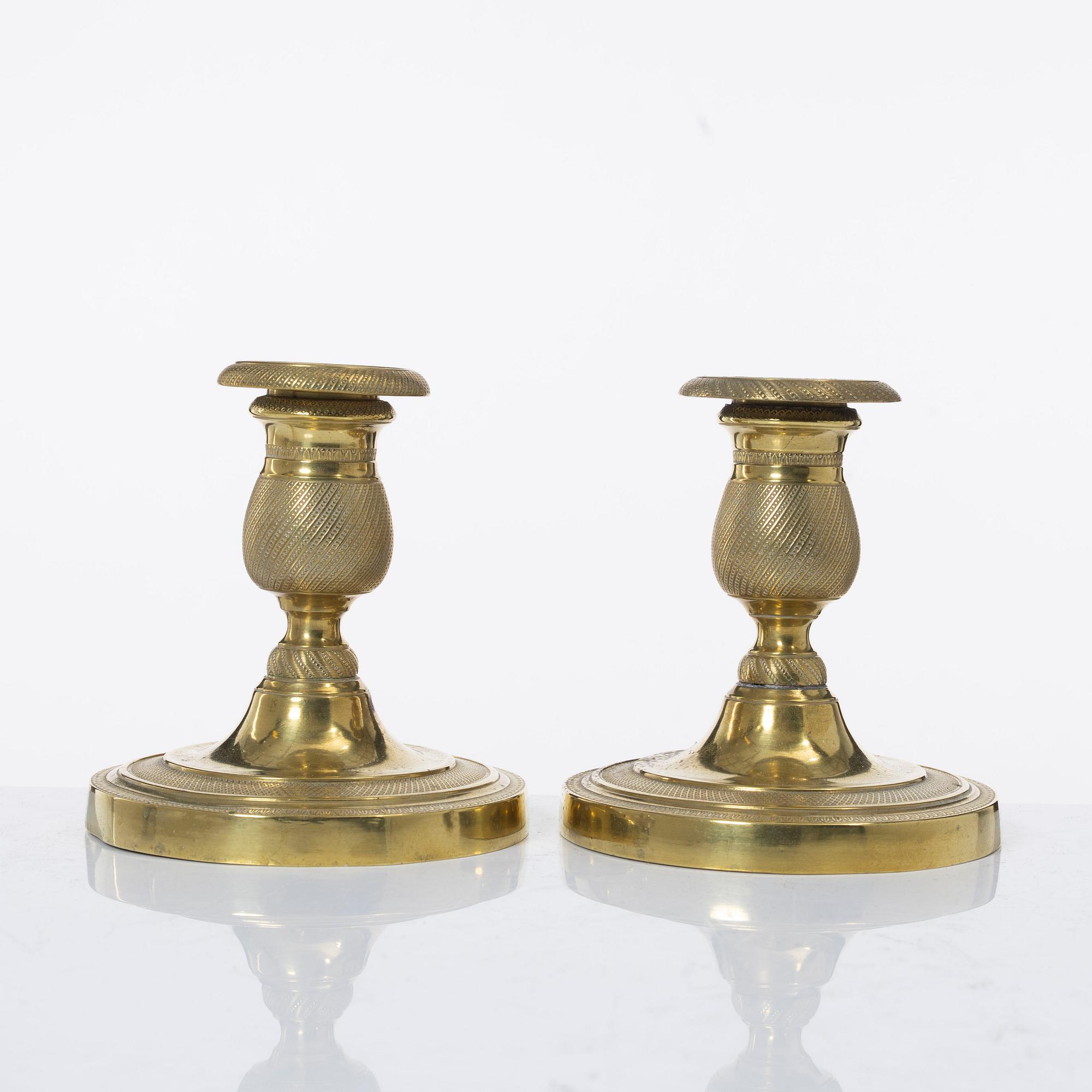 A pair of candle sticks, Empire, France, first half of the 19th century.