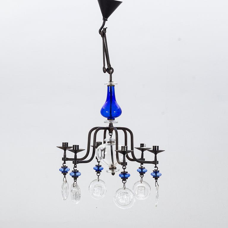 ERIK HÖGLUND, a cast iron and glass chandelier.