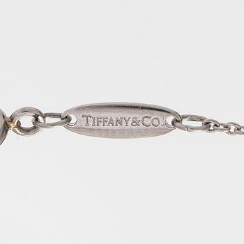 Tiffany & Co, Elsa Peretti, kaulakoru "Bean" platinaa ja timantteja.