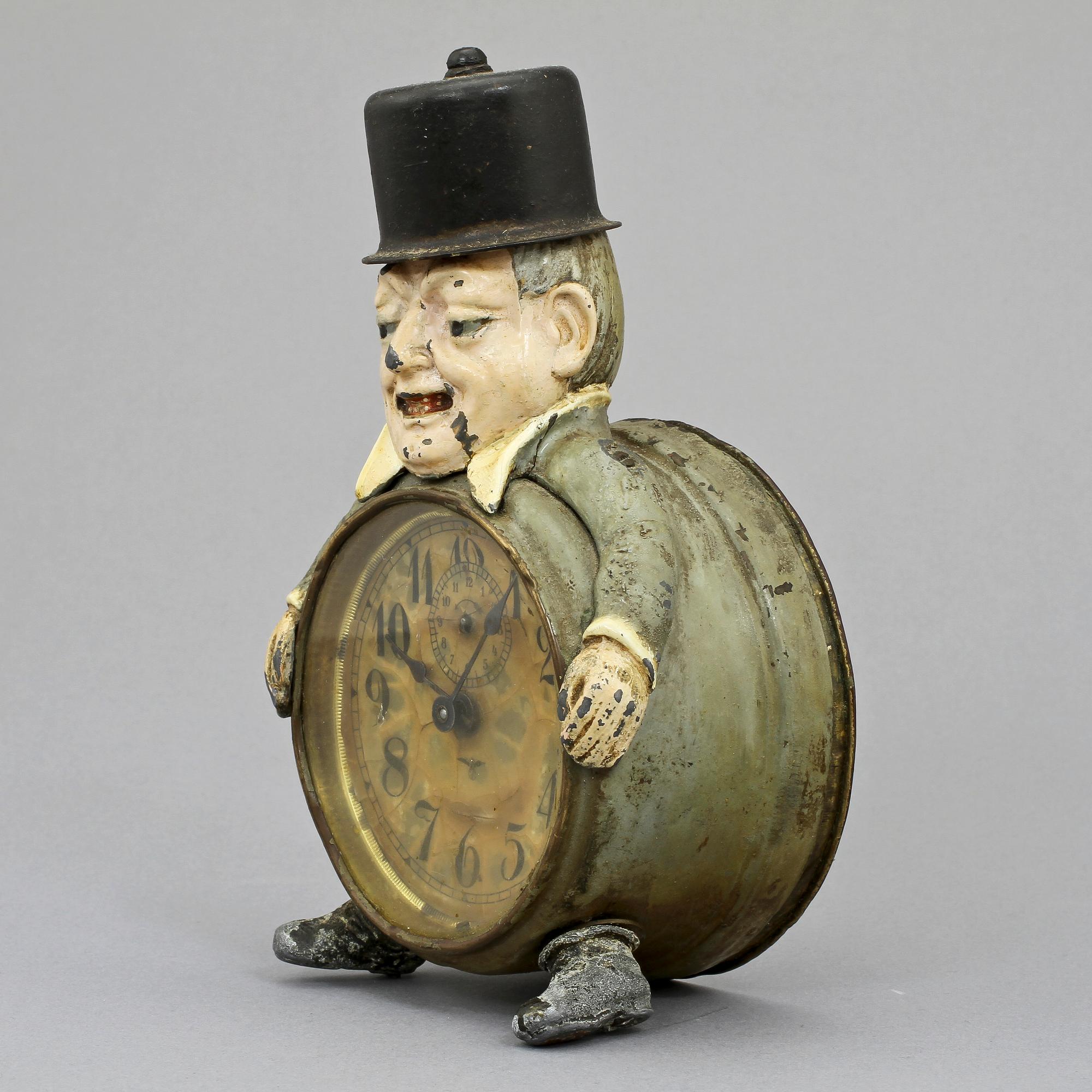 BORDSUR/VÄCKARKLOCKA, zink och gulmetall, Tyskland, tidigt 1900-tal.