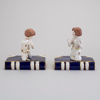 BOKSTÖD, ett par, porslin, Royal Dux, 1900-tal.