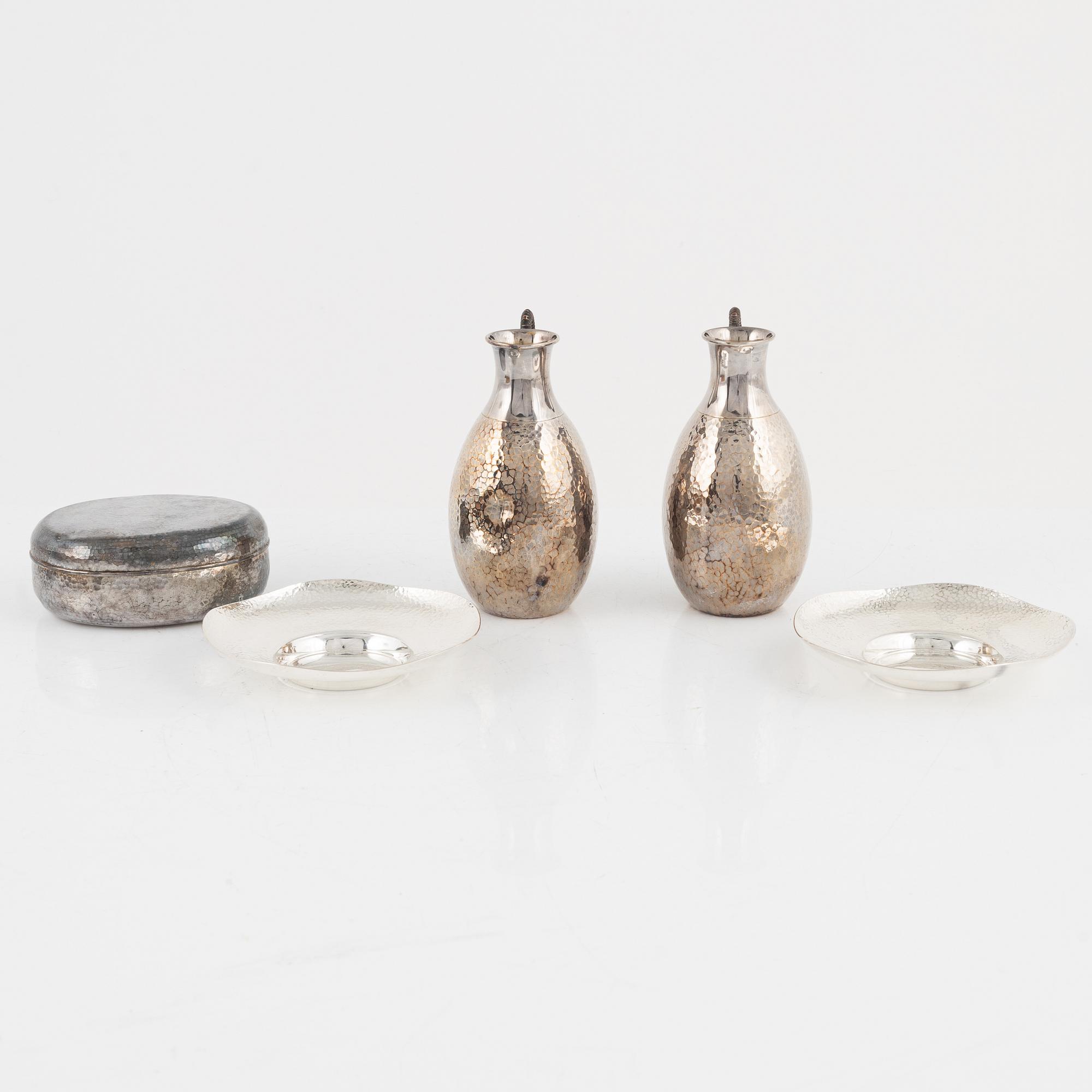 Two Japanese silver dishes, two small ewers and a box with cover, 20th Century.