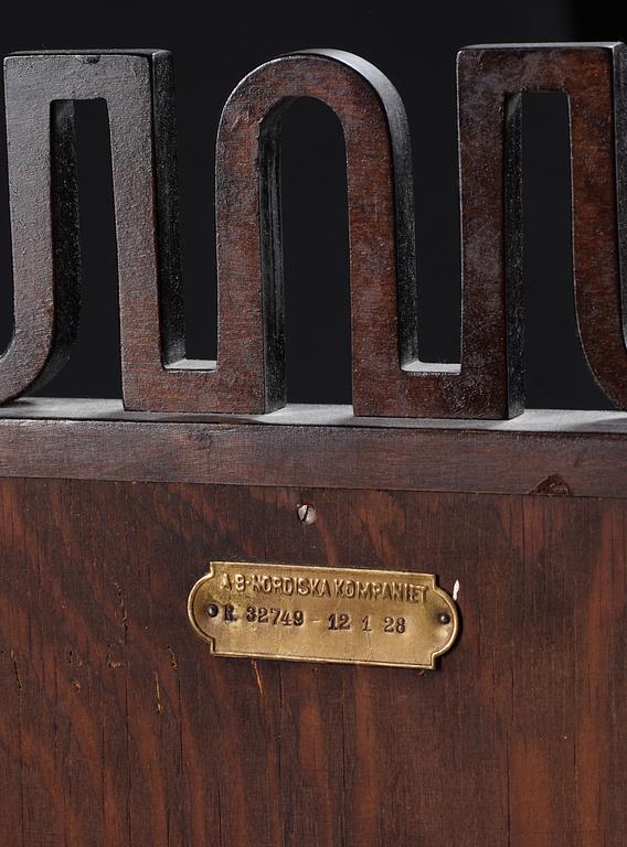 An Axel-Einar Hjorth stained birch 'Coolidge' console table with mirror, NK Sweden 1927.