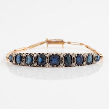 Bracelet 14K gold with dark sapphires and old-cut diamonds.