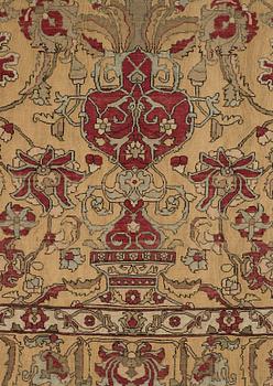 A carpet, an antique silk metal brocaded Kashan, probably around 1910, ca 200-202,5 x 129-131 cm.